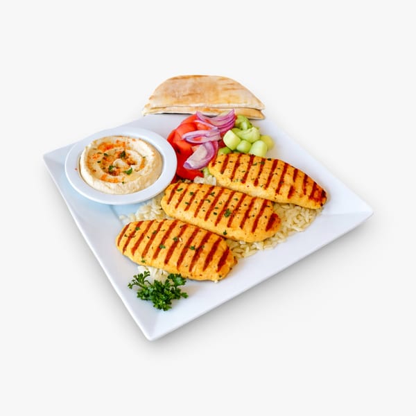California Pita & Grill's chicken kabob plate with rice, hummus, salad, and pita bread.